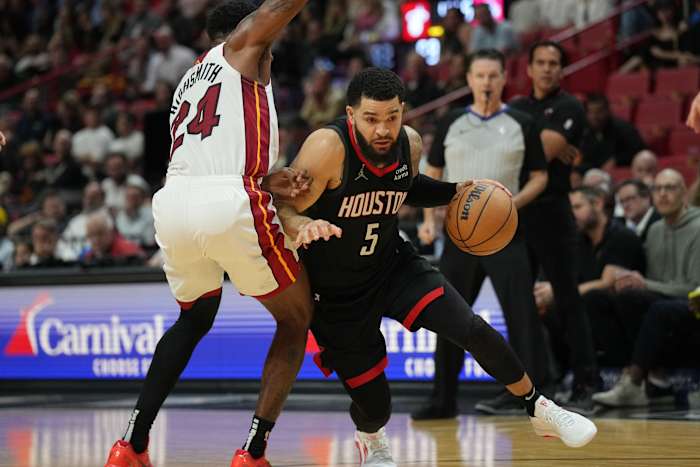 Rockets guard Fred VanVleet drives past Miami Heat forward Haywood Highsmith (24) during the first half at Kaseya Center.